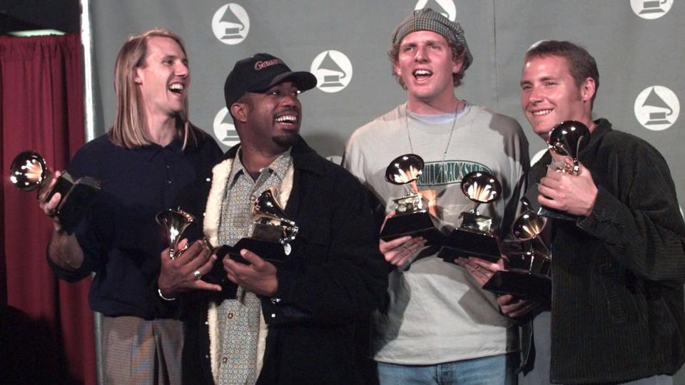Mandatory Credit: Photo by Reed Saxon/AP/Shutterstock (6516264a)HOOTIE & THE BLOWFISH BRYAN RUCKER SONIEFELD FELBER Hootie & the Blowfish show-off the two Grammys they won at the 38th annual Grammy Awards at the Shrine Auditorium in Los Angeles.