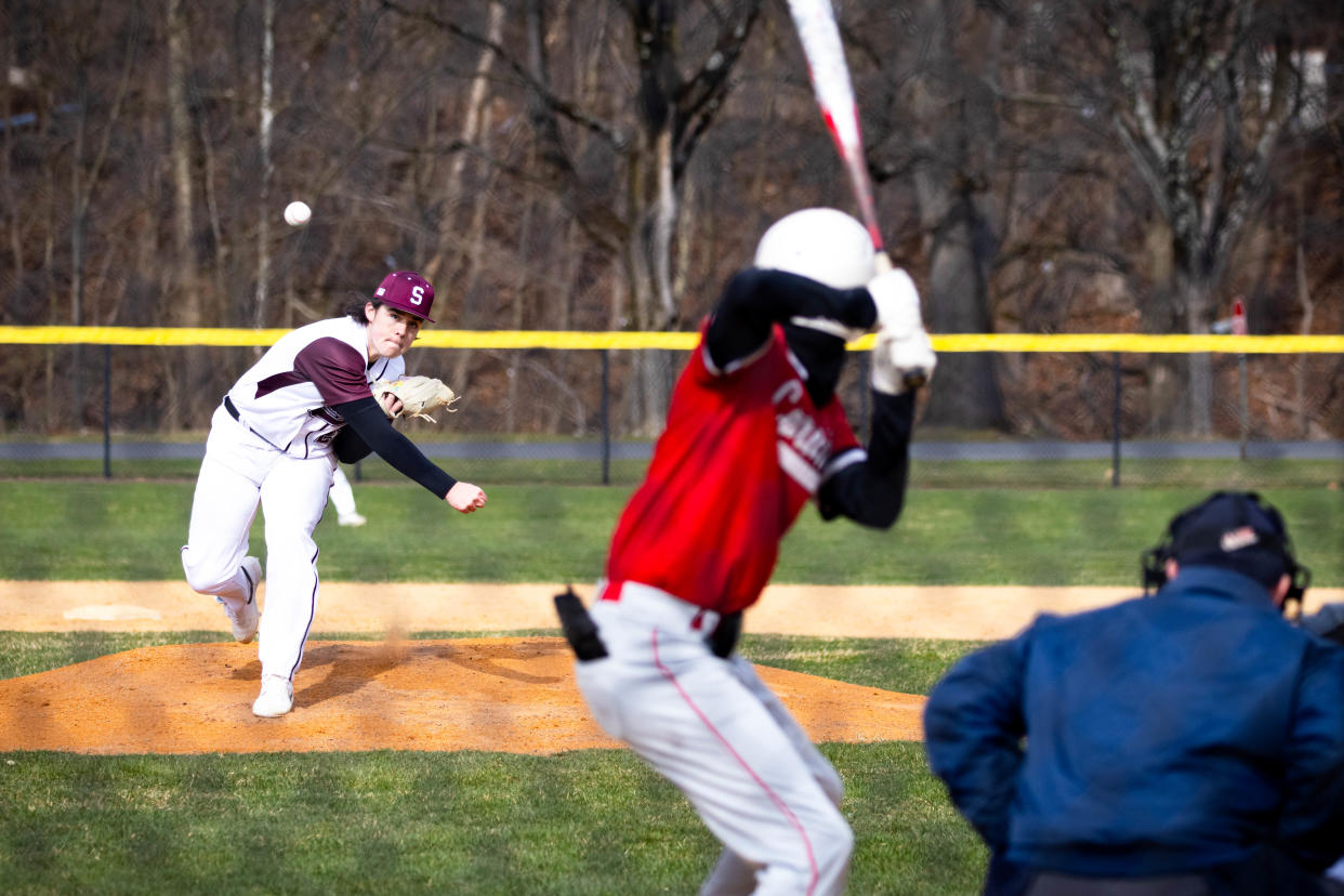 Stroudsburg High School's Anthony Knight (21) throws a fast ball straight down the middle to Pocono Mountain East's Jayden Martinez (1) on the Opening Night of Baseball on March 19, 2024