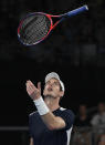 Britain's Andy Murray's throws his racket in frustration during his first round match against Spain's Roberto Bautista Agut at the Australian Open tennis championships in Melbourne, Australia, Monday, Jan. 14, 2019. (AP Photo/Andy Brownbill)