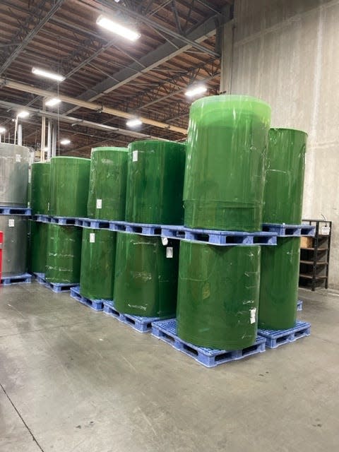 Sheets made from recycled PET plastic at Pinnpack's Oxnard plant stand ready to be shaped into clamshell-style food containers. The company is one of three local businesses getting a low-interest loan through a county program that promotes recycling.