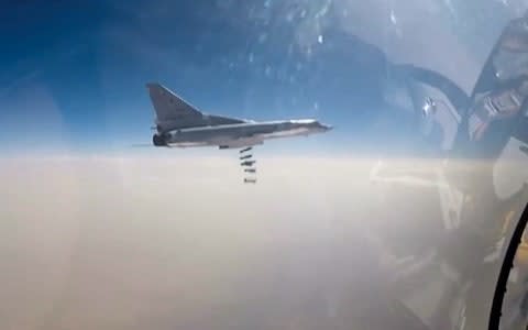 A Russian Tupolev Tu-22M3 bombs targets in the Deir Ezzor region in November - Credit: TASS via Getty Images