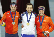 <p>Denis Yuskov of Russia, centre, who finished in first place, Thomas Krol of Netherlands, left, second placed, and Koen Verweij of Netherlands, right, who finished third, pose with their medals after men’s 1500m race during the European Speed Skating Championship, at the Speed Skating Centre Kolomna, Russia, Friday, Jan. 5, 2018. (AP Photo/Pavel Golovkin) </p>