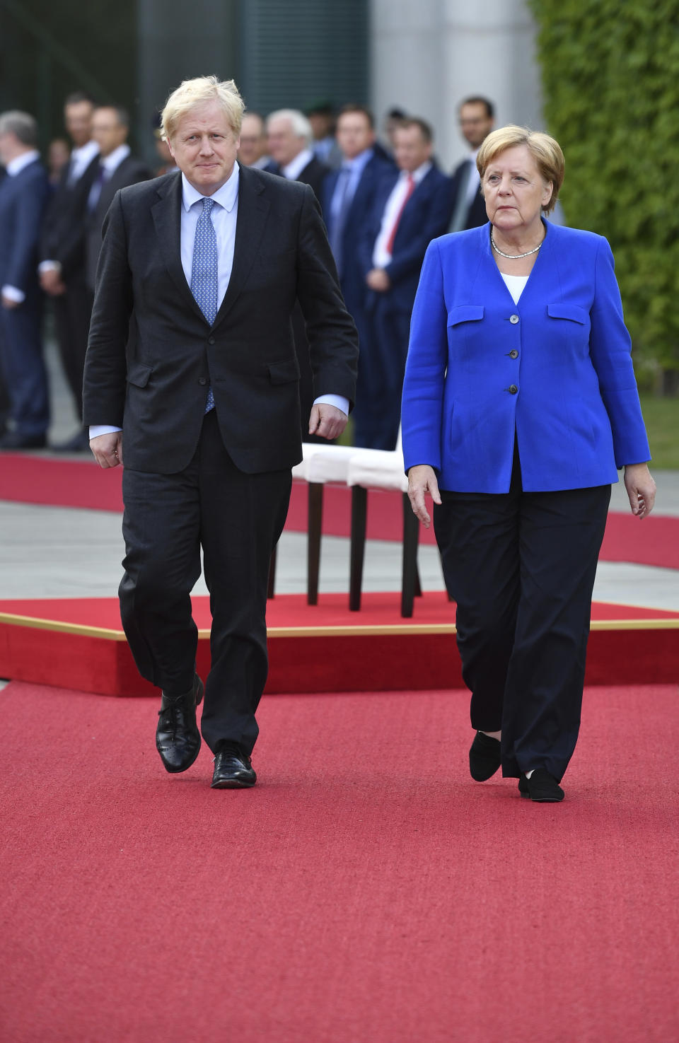 Germany's Chancellor Angela Merkel meets with British Prime Minister Boris Johnson, in Berlin, Wednesday, Aug. 21, 2019. German Chancellor Angela Merkel says she plans to discuss with UK Prime Minister Boris Johnson how Britain's exit from the European Union can be "as frictionless as possible." (Bernd Von Jutrczenka/dpa via AP)