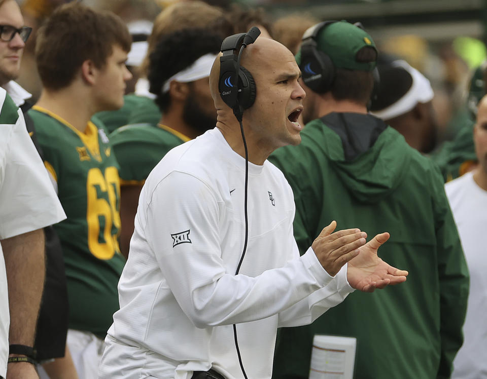 Baylor head coach Dave Aranda calls to his players in the second half of an NCAA college football game against Texas Tech, Saturday, Nov. 27, 2021, in Waco, Texas. (AP Photo/Jerry Larson)