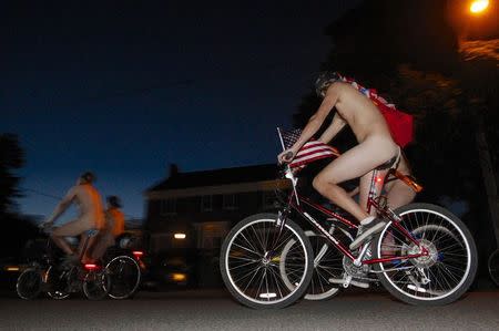 Cyclists pour into the streets of Portland for the 11th annual World Naked Bike Ride June 7, 2014. REUTERS/Steve Dipaola