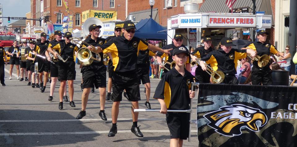 The Colonel Crawford High School band dances its way down the street during a parade at the 2021 Bucyrus Bratwurst Festival.
(Photo: Gere Goble/Telegraph-Forum)