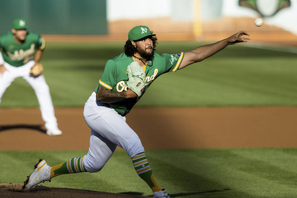 Oakland Athletics starting pitcher Sean Manaea throws against the Los Angeles Angels during the first inning of a baseball game in Oakland, Calif., Monday, June 14, 2021. (AP Photo/John Hefti)