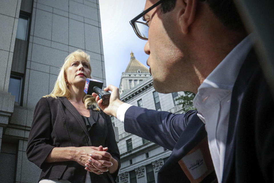 Sigrid McCawley, attorney for alleged sexual abuse victims of financier Jeffrey Epstein who committed suicide while awaiting trial, addresses the media after a hearing in Manhattan Federal Court to discuss plans for unsealing more court records for a civil case against Epstein, Wednesday Sept. 4, 2019, in New York. (AP Photo/Bebeto Matthews)
