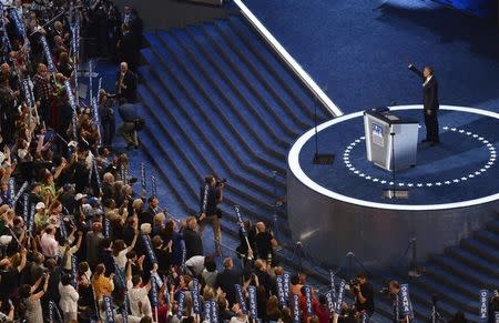 U.S. President Barack Obama waves to delegates at the Democratic National Convention in Philadelphia, Pennsylvania. U.S. July 27, 2016. REUTERS/Charles Mostoller