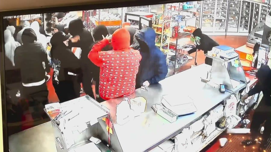 Surveillance video shows a large mob ransacking Ruben’s Bakery & Mexican Food in Compton, California. Jan. 2, 2024.