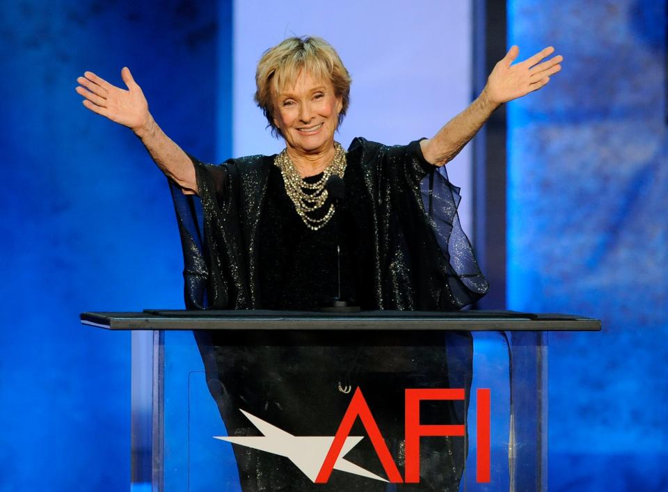 Actress Cloris Leachman gestures to honoree Mel Brooks in the audience during the American Film Institute's 41st Lifetime Achievement Award Gala in June 2013 in Los Angeles.