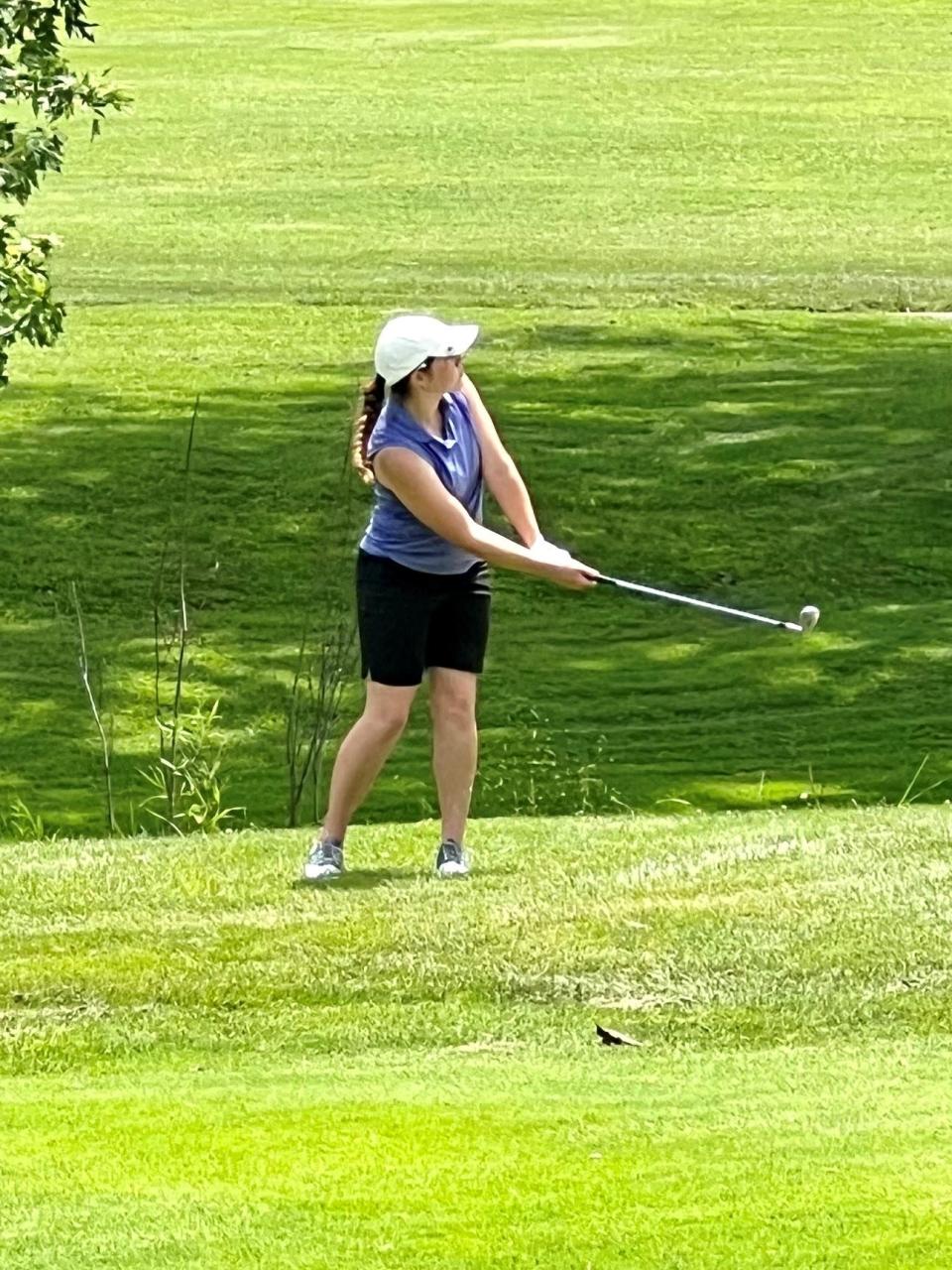 Pleasant's Maura Murphy chips onto the green during the final round of the 47th Ohio Junior Girls Championship this summer at the Marion Country Club.