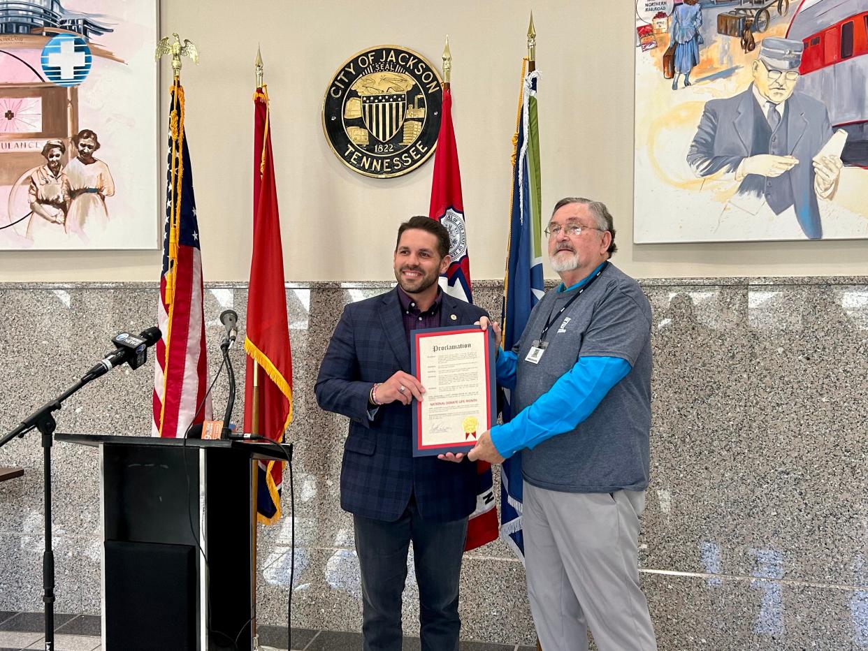 Jackson Mayor Scott Conger presents organ-transplant recipient Don Kimberly with a proclamation declaring April as "Donate Life Month" at City Hall on April 12, 2022 in Jackson, Ten..
