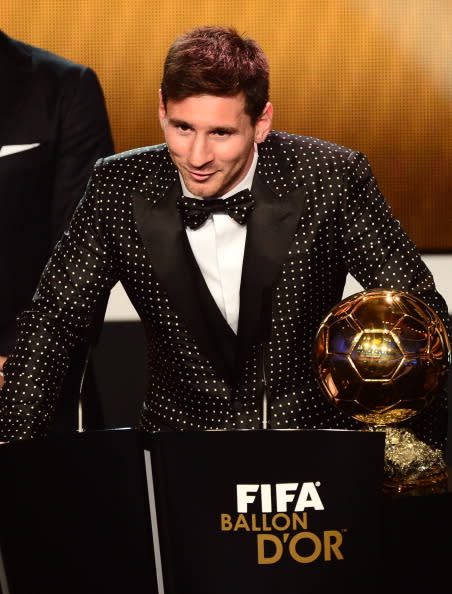 Barcelona's Argentinian forward Lionel Messi receives the FIFA Ballon d'Or award during the FIFA Ballon d'Or awards ceremony at the Kongresshaus in Zurich on January 7, 2013. AFP PHOTO / OLIVIER MORIN (Photo credit should read OLIVIER MORIN/AFP/Getty Images)