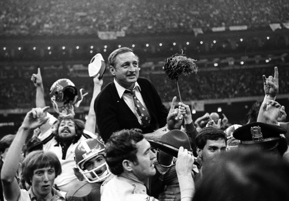 Georgia football coach Vince Dooley is carried off the field after Georgia defeated Notre Dame 17-10 in the Sugar Bowl on Jan. 1, 1981, in New Orleans.