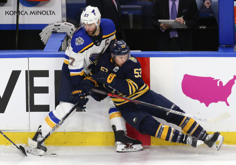 Buffalo Sabres forward Jeff Skinner (53) and St. Louis Blues defenseman Alex Pietrangelo (27) collide during the first period of an NHL hockey game, Tuesday, Dec. 10, 2019, in Buffalo, N.Y. (AP Photo/Jeffrey T. Barnes)
