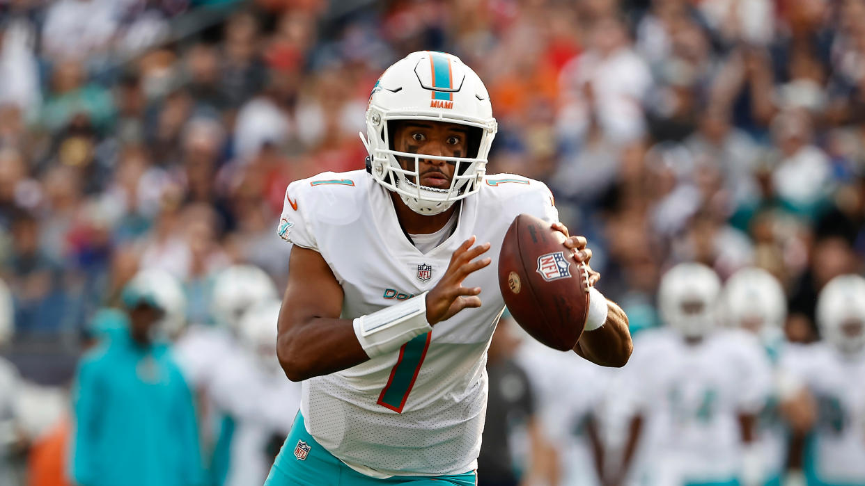 Miami Dolphins quarterback Tua Tagovailoa looks to throw against the New England Patriots during the first half of an NFL football game, Sunday, Sept. 12, 2021, in Foxborough, Mass. (AP Photo/Winslow Townson)