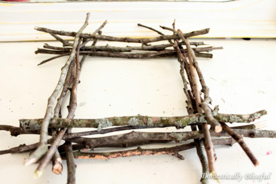 <p>Domestically Blissful</p><p>This all-natural DIY frame idea from <a href="https://domesticallyblissful.com/twig-frame/" rel="nofollow noopener" target="_blank" data-ylk="slk:Domestically Blissful;elm:context_link;itc:0;sec:content-canvas" class="link ">Domestically Blissful</a> gives you the excuse to go on a fun hike with your kid so you can collect the supplies! </p>