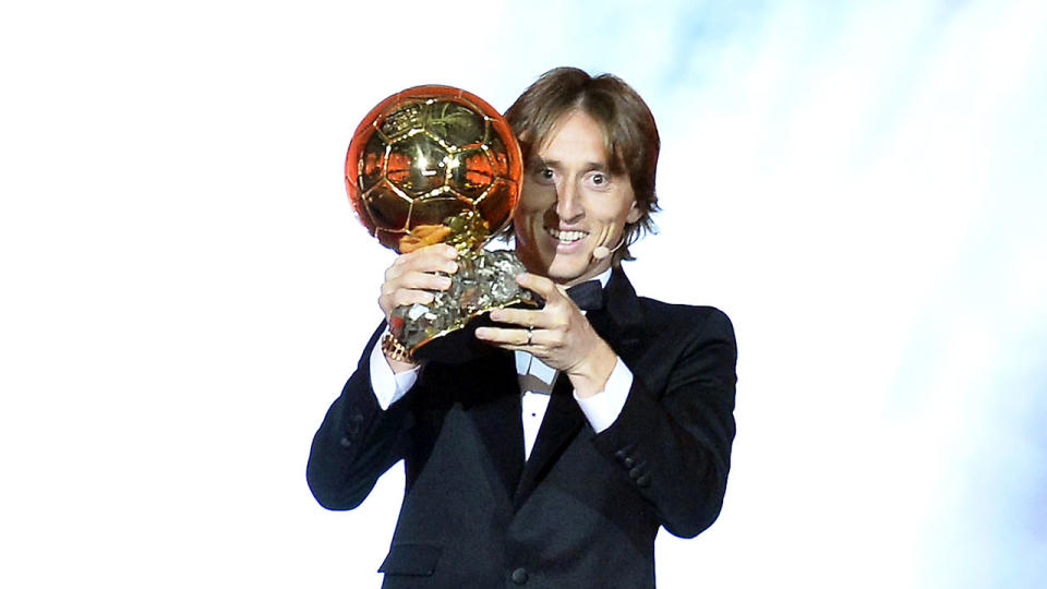 Modric celebrates his Ballon d’Or triumph. Pic: Getty