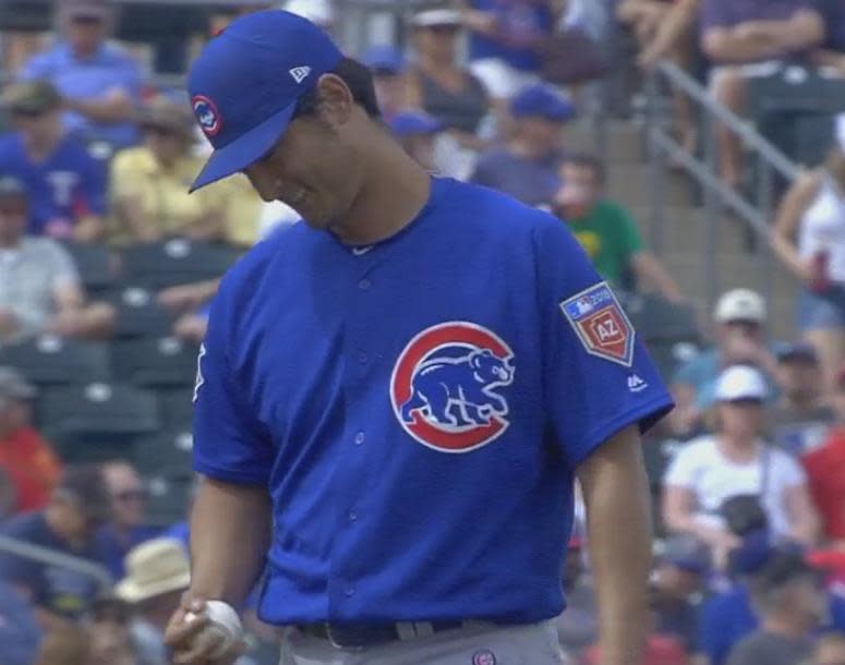 Cubs right-hander Yu Darvish can’t hide his laugh after fooling Rangers hitter Drew Robinson with a hesitation fastball. (MLB.TV)