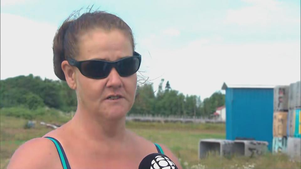 Ally Wescott is a smoke shed employee in the Cap-Acadie area who is saddened by the loss of another local employer.