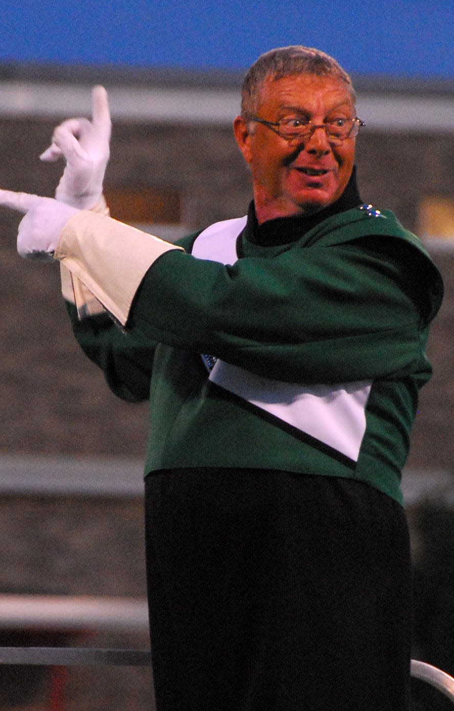 Ed Reese, drum major for the Mighty St. Joe’s Alumni Corps, plays with the crowd during a past performance at Music under the Stars in Hornell.