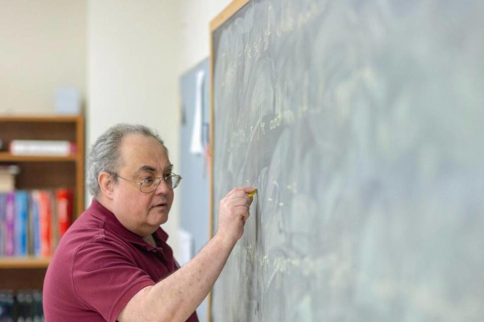 Roy Reynolds, a math teacher at the David School in David, Ky., teaches a class on Thursday, Feb. 8, 2024.. Located in Floyd County, the school was founded in the early 1970s as an alternative for students at risk of dropping out of public schools.