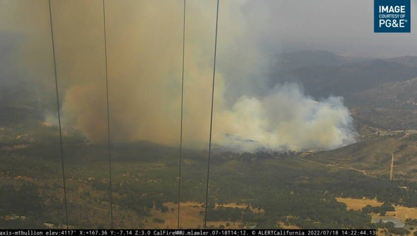 A screen shot of an image provide by PG&E of a brush fire where an Evacuation order was issued for half of Mariposa County, CA due to Agua Fire