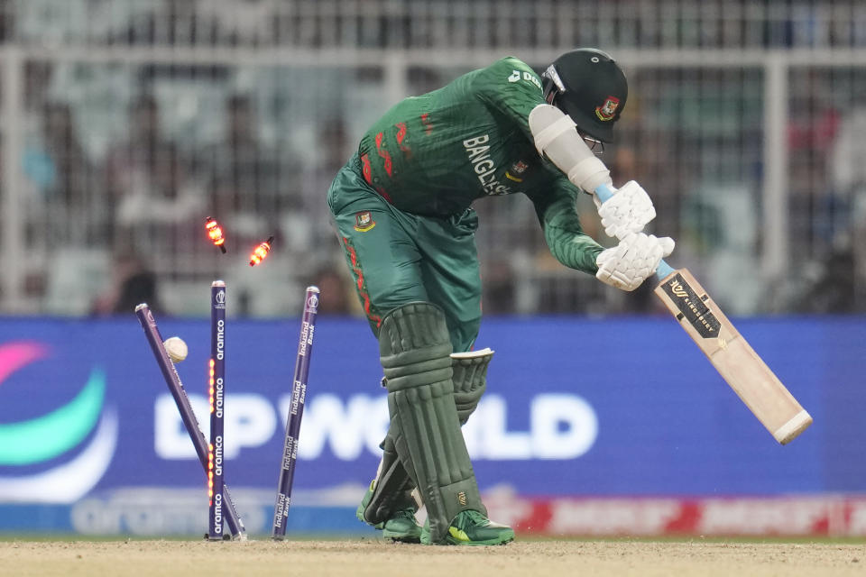 Bangladesh's Taskin Ahmed is bowled out by Pakistan's Mohammad Wasim during the ICC Men's Cricket World Cup match between Bangladesh and Pakistan in Kolkata, India, Tuesday, Oct. 31, 2023. (AP Photo/Aijaz Rahi)