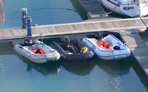 Dinghies used by suspected migrants sit in the Port of Dover - Credit: Steve Finn