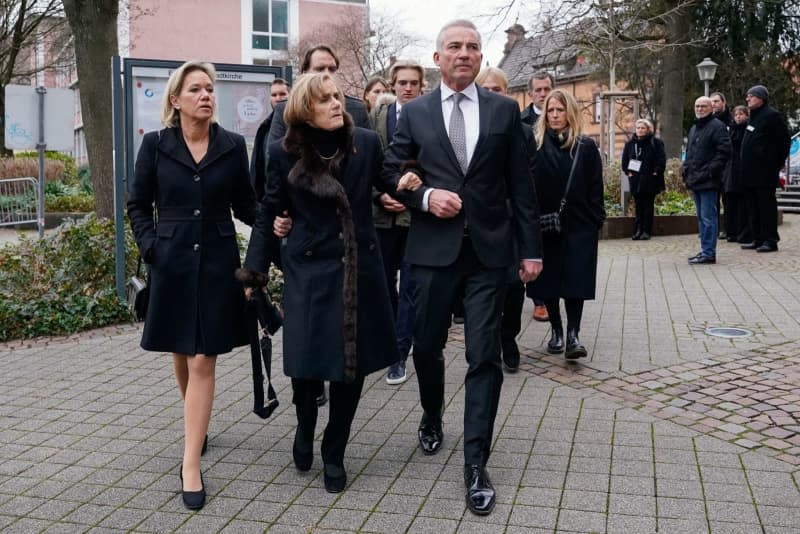 (L-R) The family with Christine Strobl, daughter of Wolfgang Schauble, Ingeborg Schauble, his wife, and Thomas Strobl, Minister of the Interior of Baden-Wurttemberg and son-in-law of Wolfgang Schauble, arrive at the Evangelical City Church for the funeral service for Wolfgang Schauble. Uwe Anspach/dpa