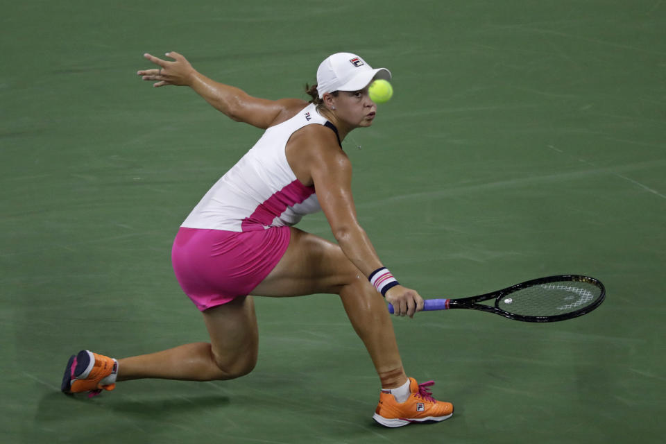Ashleigh Barty, of Australia, returns a shot to Lauren Davis during the second round of the U.S. Open tennis tournament Wednesday, Aug. 28, 2019, in New York. (AP Photo/Adam Hunger)