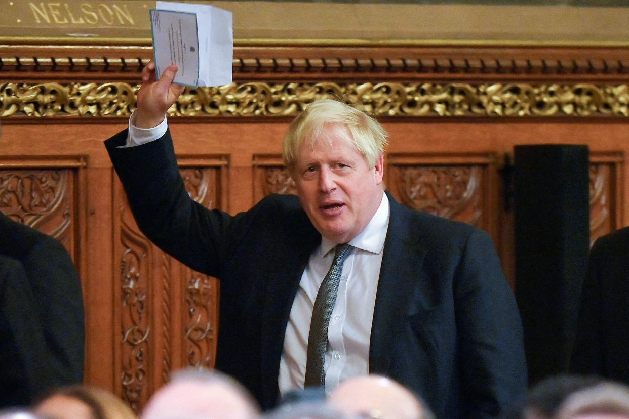 Britain's former prime minister Boris Johnson gestures as he waits for the arrival of South Africa's president to the Palace of Westminster, home to Britain's House of Commons and House of Lords, both houses of parliament, in London on November 22, 2022, as part of his two-day state visit. (Photo by TOBY MELVILLE / POOL / AFP) (Photo by TOBY MELVILLE/POOL/AFP via Getty Images)