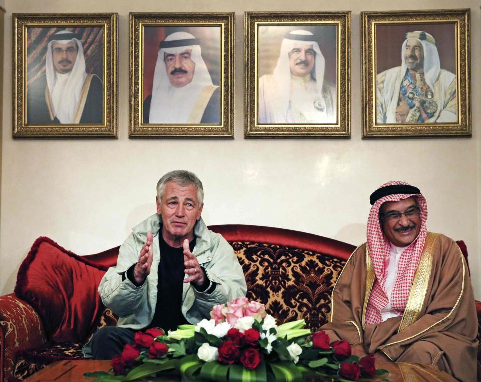 U.S. Secretary of Defense Hagel is welcomed by Bahrain's Minister of State for Defense, Lt-Gen Dr. Shaikh Mohammed in Manama