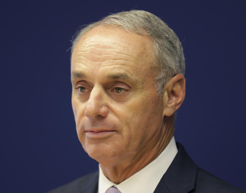 Major League Baseball commissioner Rob Manfred speaks to reporters after a meeting of baseball team owners in New York, Thursday, June 20, 2019. The Tampa Bay Rays have received permission from Major League Baseball's executive council to explore a plan that could see the team split its home games between the Tampa Bay area and Montreal, reports said Thursday. (AP Photo/Seth Wenig)