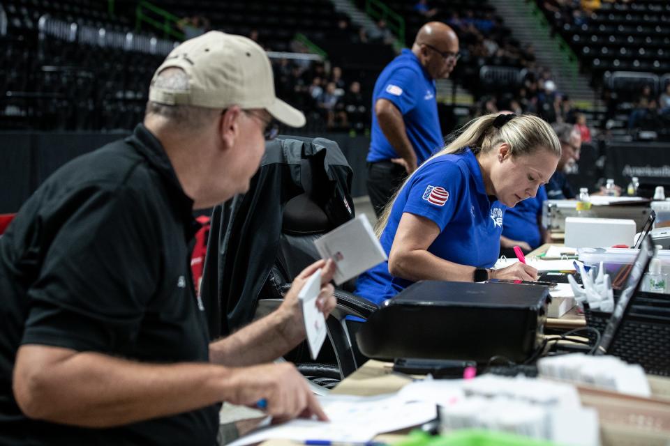 STABA Secretary Sabrina Luis takes stats during the Junior Olympic boxing tournament at the American Bank Center in Corpus Christi, Texas, Friday, June 10, 2022.
