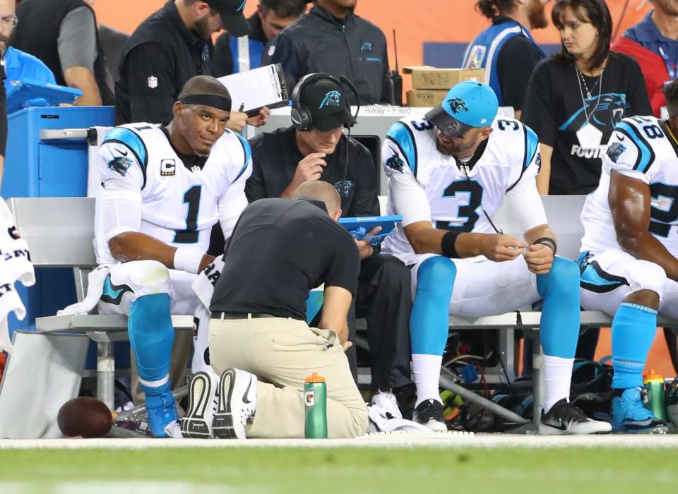 Sep 8, 2016; Denver, CO, USA; Carolina Panthers quarterback Cam Newton (1) and quarterback Derek Anderson (3) with quarterbacks coach Ken Dorsey against the Denver Broncos at Sports Authority Field at Mile High. The Broncos defeated the Panthers 21-20. Mandatory Credit: Mark J. Rebilas-USA TODAY Sports