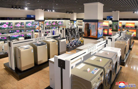 FILE PHOTO: Appliances and televisions displayed inside Daesong Department Store in North Korea, in this undated photo released on April 15, 2019 by North Korea's Korean Central News Agency (KCNA). KCNA via REUTERS/File Photo