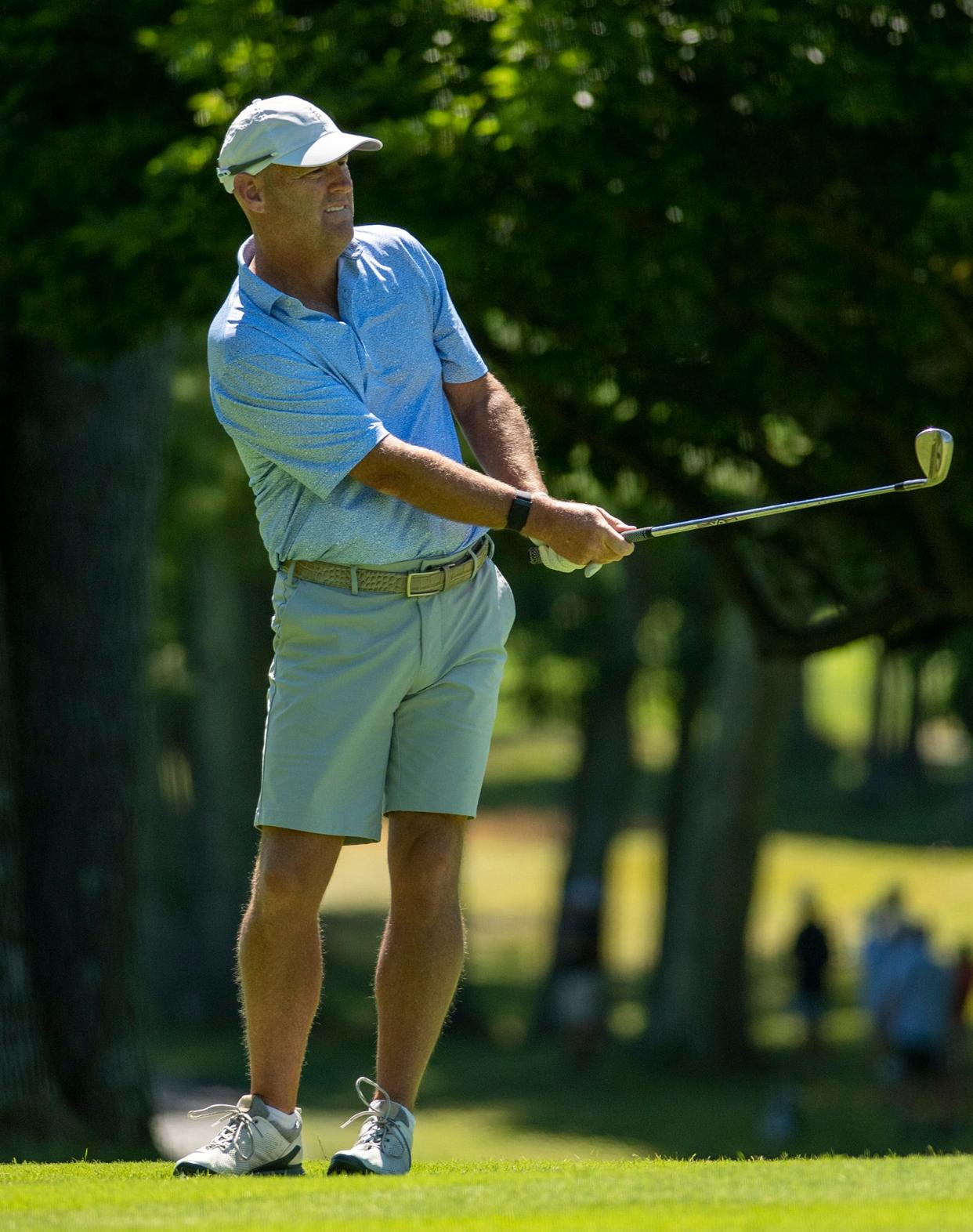 Brendan Hester chips onto the 14th green Sunday during the Worcester County Amateur in 2022.