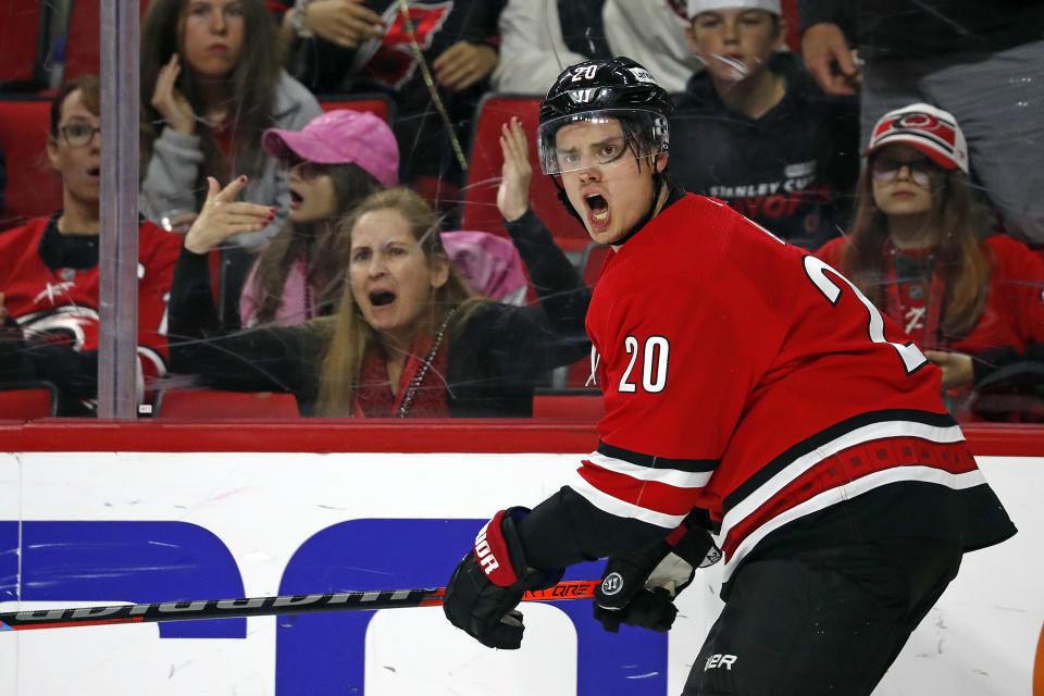 Carolina Hurricanes' Sebastian Aho (20) protests the lack of a call during the second period of the team's NHL hockey game against the Buffalo Sabres in Raleigh, N.C., Thursday, April 7, 2022. (AP Photo/Karl B DeBlaker)