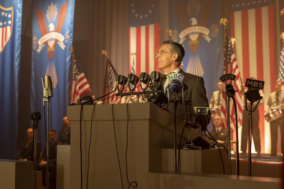 This image released by HBO shows John Turturro in a scene from "The Plot Against America." The limited series is based on Philip Roth’s novel that posits a repressive 1930s U.S. government led by Charles Lindbergh, the real-life aviation hero and anti-Semitic isolationist. (Michele K. Short/HBO via AP)