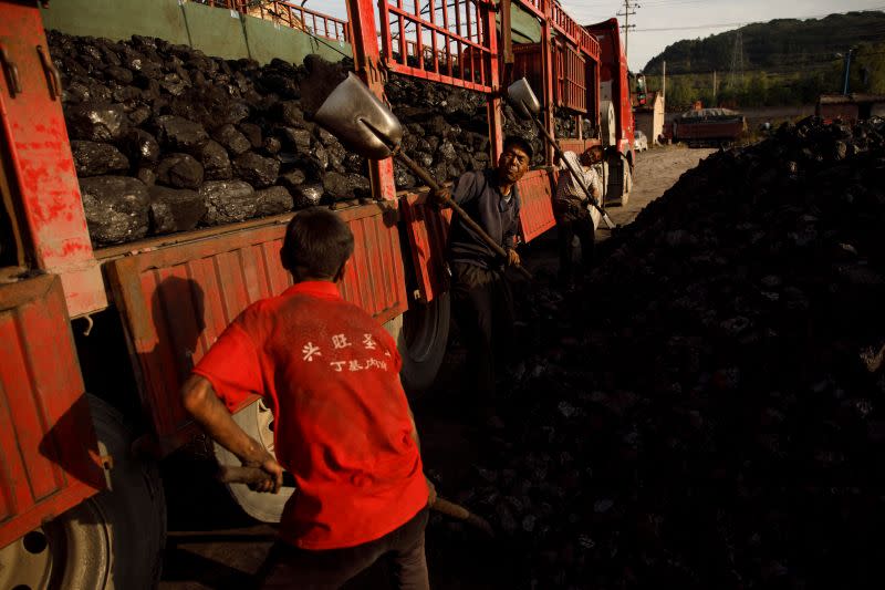 The Wider Image: Energy security and economic fears drive China's return to coal