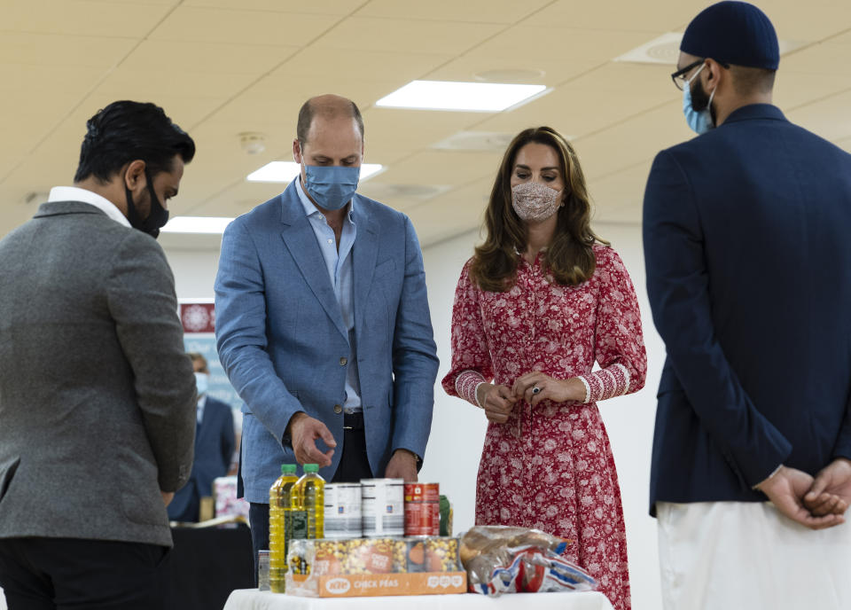 The Duke and Duchess of Cambridge during a visit to the East London Mosque where they chatted to volunteers who cooked and delivered meals to vulnerable members of the community during the pandemic.