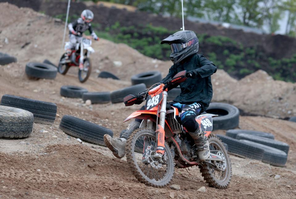 Christian Hilton, 13 of Macomb Township takes his bike around the newly opened youth course at Holly Oaks ORV Park in Holly on Saturday, May 20, 2023.  
The off road park held an event where kids on various recreational vehicles could ride for free to help promote the new section of the off road course. Hilton was among several riders who came out to demonstrate the capabilities of the course.