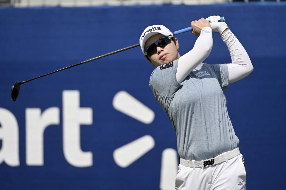 Eun-Hee Ji watches her shot on the first tee during the final round of the LPGA Walmart NW Arkansas Championship golf tournament Sunday, Oct. 1, 2023, in Rogers, Ark. (AP Photo/Michael Woods)