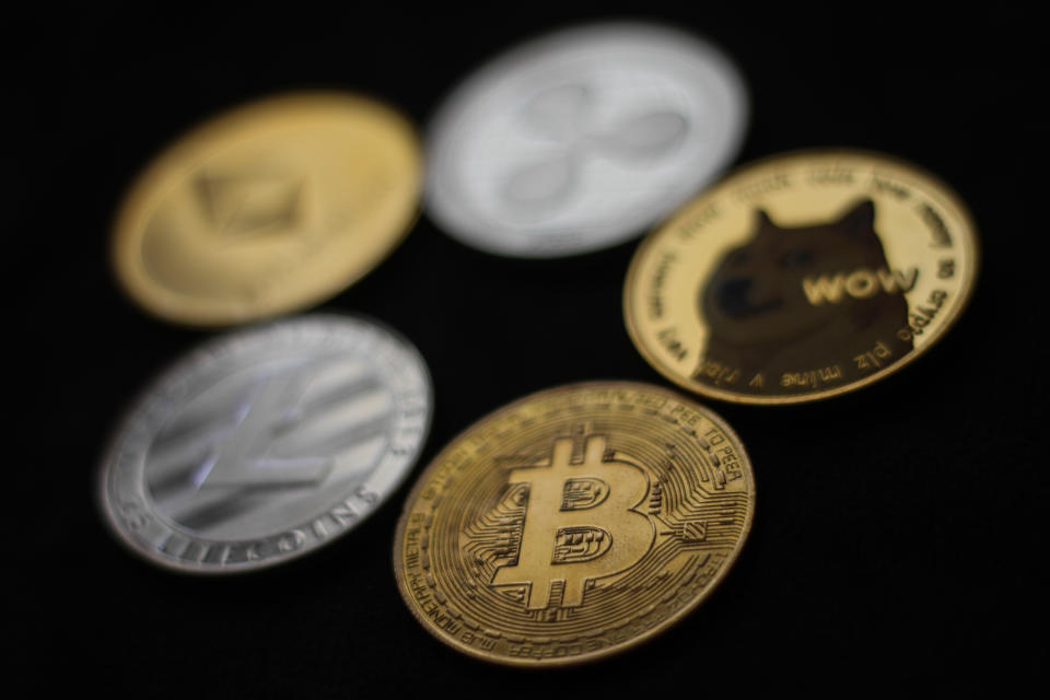 Representation of cryptocurrencies are seen in this illustration photo taken in Krakow, Poland on June 29, 2021 (Photo Illustration by Jakub Porzycki/NurPhoto via Getty Images)