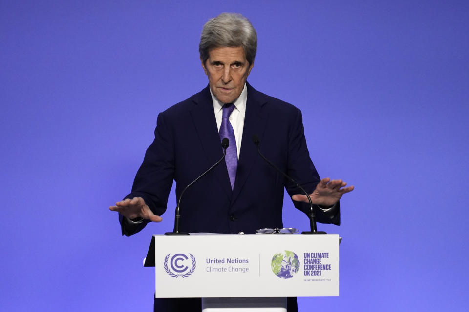 John Kerry, United States Special Presidential Envoy for Climate gestures during a press conference at the end of the COP26 U.N. Climate Summit in Glasgow, Scotland, Saturday, Nov. 13, 2021. Almost 200 nations have accepted a contentious climate compromise aimed at keeping a key global warming target alive, but it contained a last-minute change that watered down crucial language about coal. (AP Photo/Alberto Pezzali)