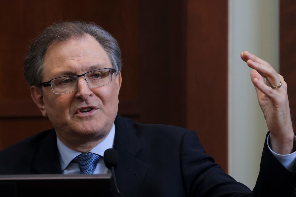 Bryan Neumeister, a forensic and metadata specialist, testifies in the courtroom in the Fairfax County Circuit Courthouse in Fairfax, Va., on May 25, 2022.