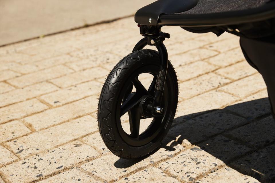 the front tire of a jogging stroller