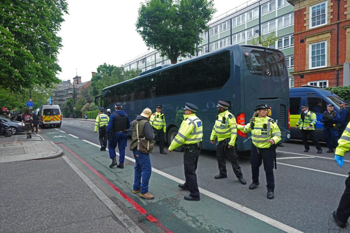 Three charged after south east London protest stops coach with asylum seekers <i>(Image: PA)</i>